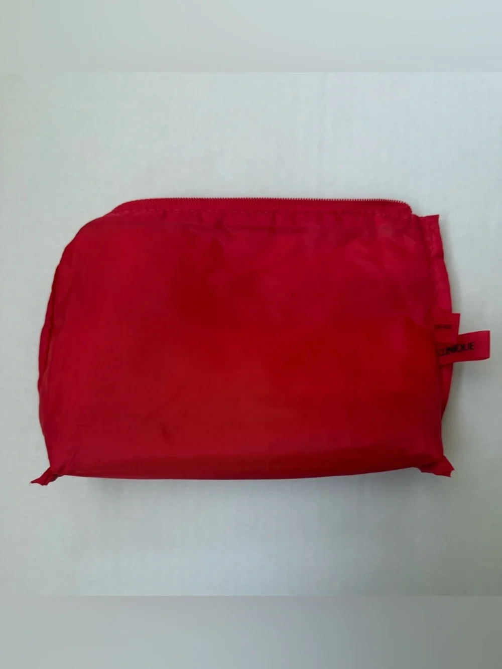 Clinique x Jonathan Cohen Zip Top Cosmetic Bag Red to Pink Ombre Striped